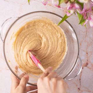 Mix the flour with the wet ingredients until the mixture becomes smooth