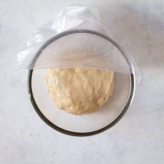  knead for about 5 -10 minutes, or until a smooth and solid ball forms. Place dough into a greased mixing bowl, cover tightly and set aside to rise for about 60-90 minutes 